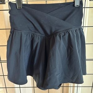 Super cute black Aerie skort with cross-cross front.